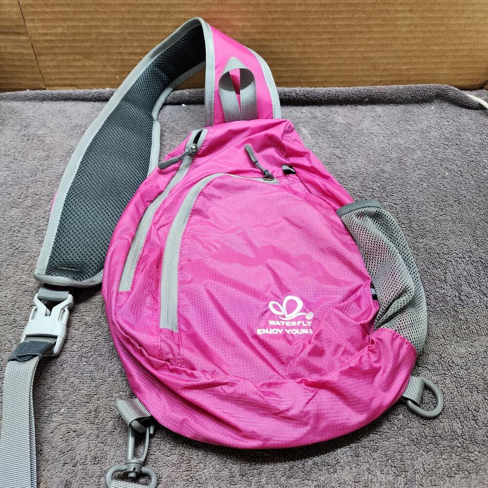 Waterfly light weight pink nylon slingbag backpack very clean EUC b51